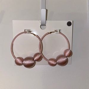 Large light pink hoop earrings